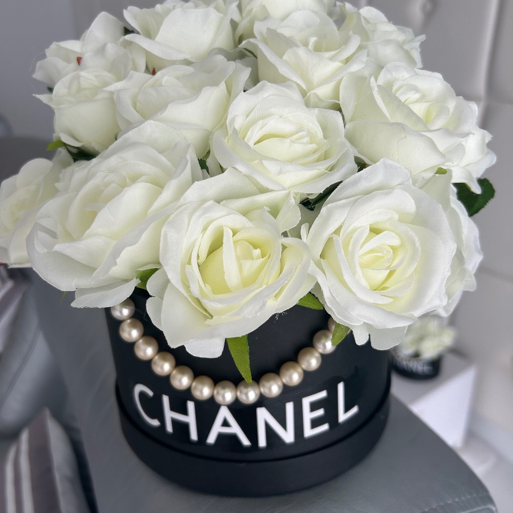 SILK ROSES in black round box with white letters and pearls